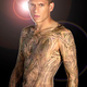 Illustration for article titled Marked men: 26-plus bad-ass characters with memorable tattoos